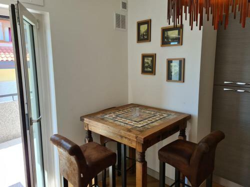 A Two Room Apartment With A Seaview