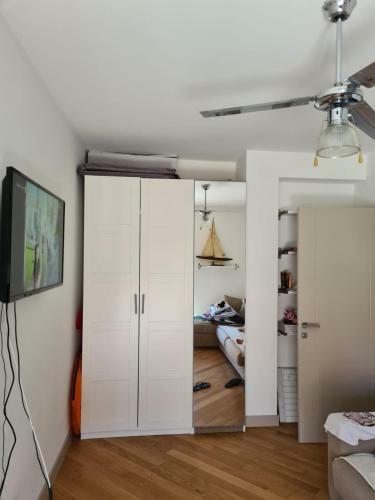 A Two Room Apartment With A Seaview