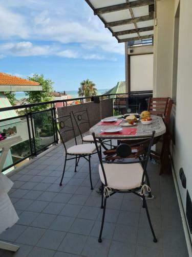 A Two Room Apartment With A Seaview