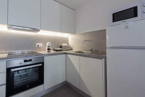 Abra�os Dos Av�s - Casas De Aldeia