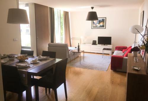 The River's Whisper Apartment