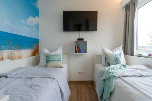 Apartamento Strandhotel-heiligenhafen-wohnung-101-typ-iv-wasserblick
