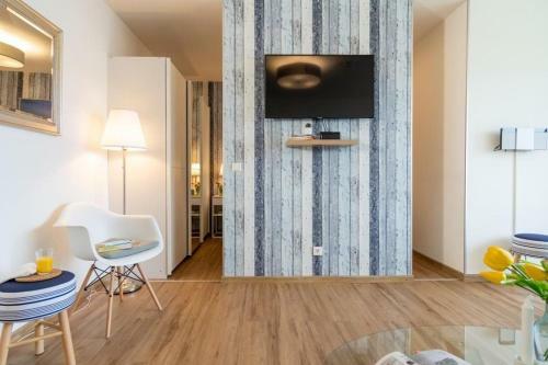 Apartamento Strandhotel-heiligenhafen-wohnung-101-typ-iv-wasserblick