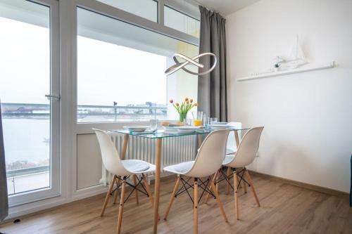 Apartamento Strandhotel-heiligenhafen-wohnung-101-typ-iv-wasserblick