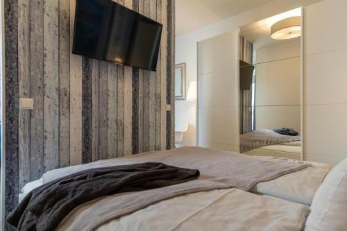 Apartamento Strandhotel-heiligenhafen-wohnung-101-typ-iv-wasserblick