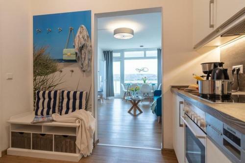 Apartamento Strandhotel-heiligenhafen-wohnung-101-typ-iv-wasserblick