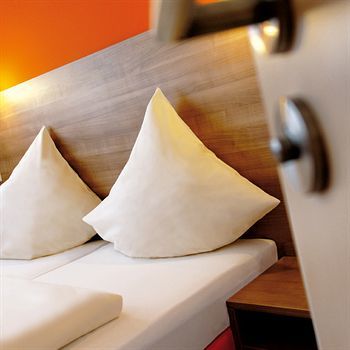 Orange Hotel Und Apartments