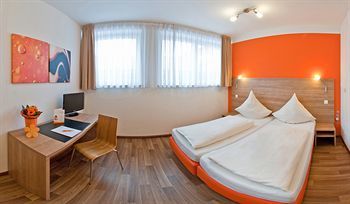 Orange Hotel Und Apartments