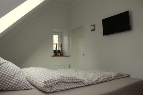 Apartamento Ferienwohnung Lodberger Scheunencafe