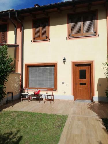 Villetta A Schiera Con Giardino Box E Posto Auto.