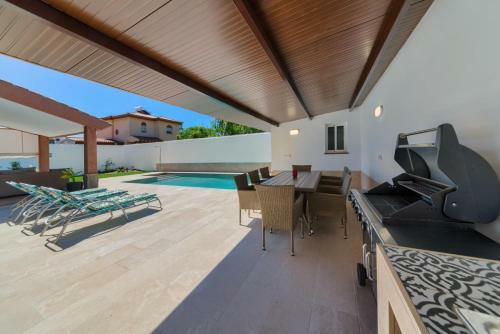 Chalet Barrosa, Santi Petri