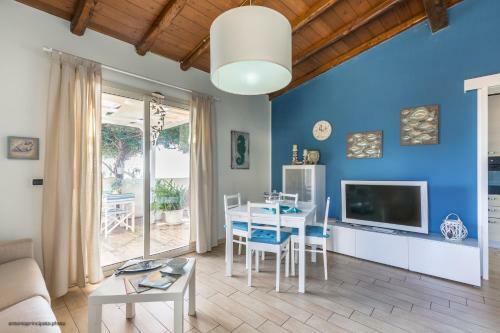 Blue House On The Sea