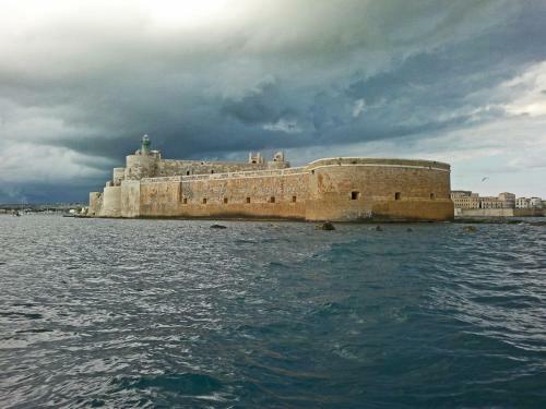 Blue House On The Sea