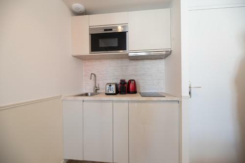 Apartamento Vignature Residence