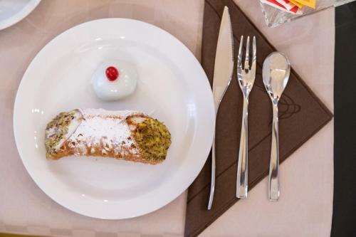 Hostal B&B - Catania Over Time