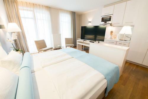 Nymphe Strandhotel & Apartments