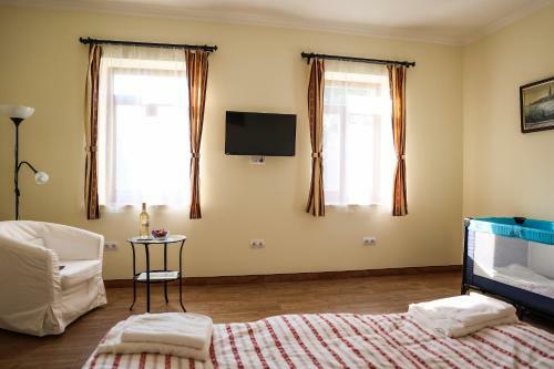 Hostal Szarvas Apartman - Jakuzzis Vend�gh�z M�ny
