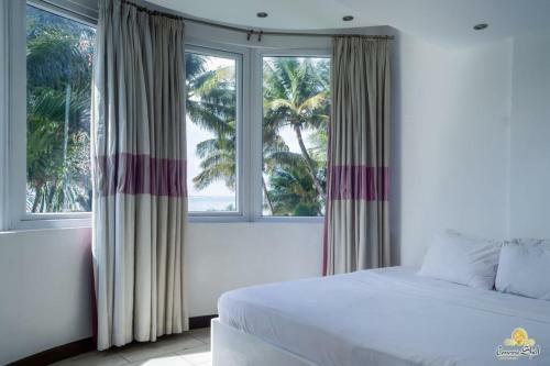 Apartamento Rosy Sea Front Beach Condo