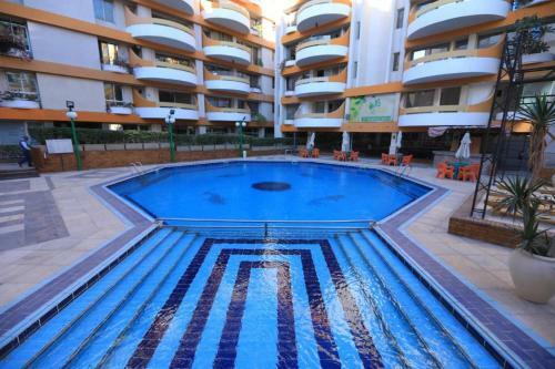 Apartment Overlooking A Pool In A Residential Condo