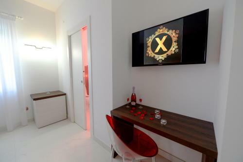 Hostal X Hotel