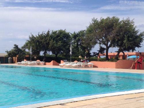 Cosy Mobile Home In Sorso With Shared Pool