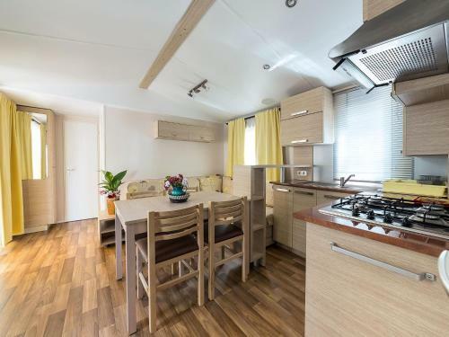 Inviting Mobile Home In Sorso With Shared Pool