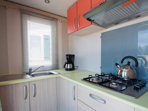 Inviting Mobile Home In Sorso With Shared Pool