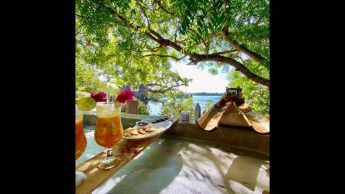 Hostal Room In Bb - Rock And Sea Resort,baobab Suite