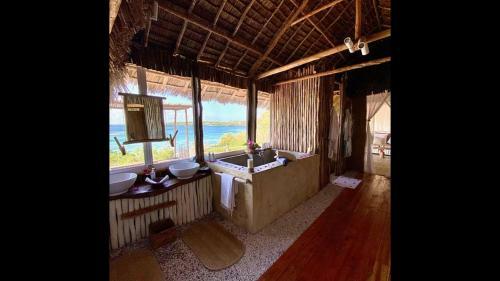 Hostal Room In Bb - Rock And Sea Resort,baobab Suite