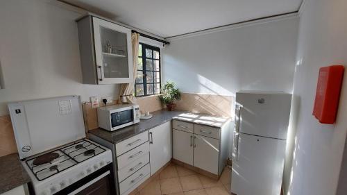 Peaceful, Spacious, Open-plan 2br Apartment Set In Large Mature Garden.