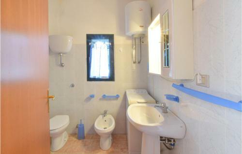 Awesome Apartment In Limpiddu Budoni With 2 Bedrooms