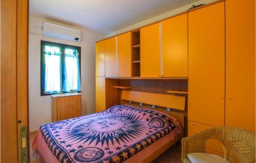 Awesome Apartment In Limpiddu Budoni With 2 Bedrooms