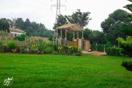 Kinzi Apartments,restaurant And Gardens