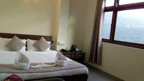 Hotel Rufina Cardamom Residency