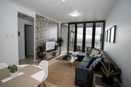 Apartamento Ushaka Waterfront - Happy Homely Horizons