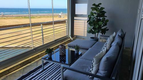 Accommodation Front - Gorgeous 4 Sleeper Beachfront Apartment