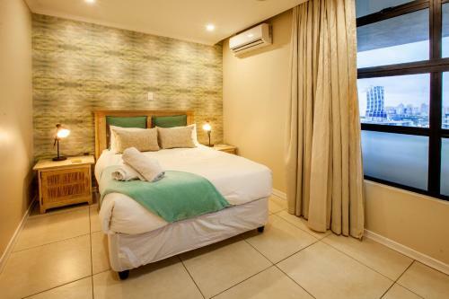 Apartamento Ushaka Waterfront - Peaceful Plentiful Penthouse