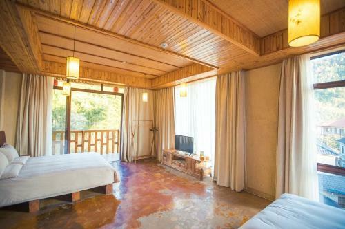 Mogan Mountain West House Hotel