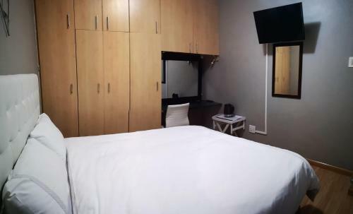Hostal Twinnpalms Accommodation