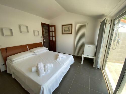 Hostal Porticciolo Rooms