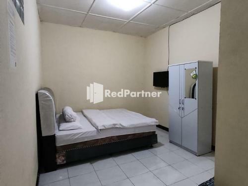 Hotel Kost Homestay Redpartner