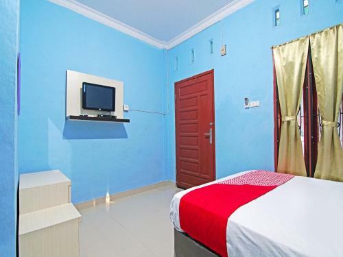 Hotel Oyo 90752 Ridho Guest House Syariah
