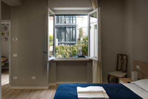 Hostal La Nuova Corte Rooms