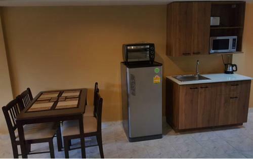 Oasis Apartments & Bar