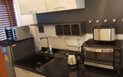 Oasis Apartments & Bar