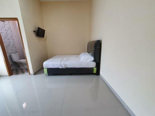 Hotel Oyo 90945 Arizon Kost