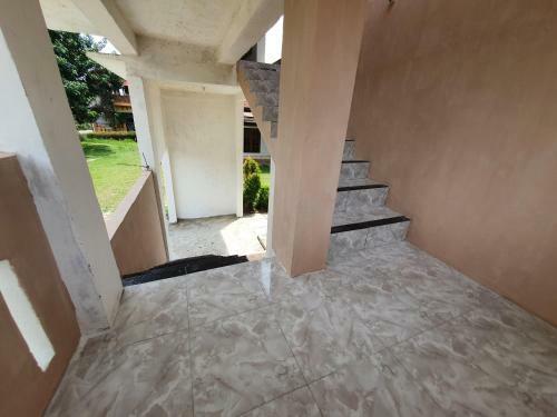 Hotel Oyo 90945 Arizon Kost