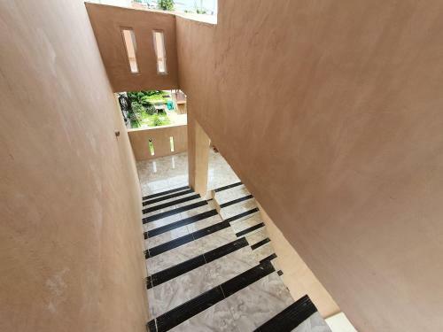 Hotel Oyo 90945 Arizon Kost
