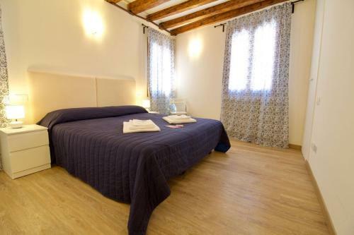 Hostal Veneziacentopercento Rooms