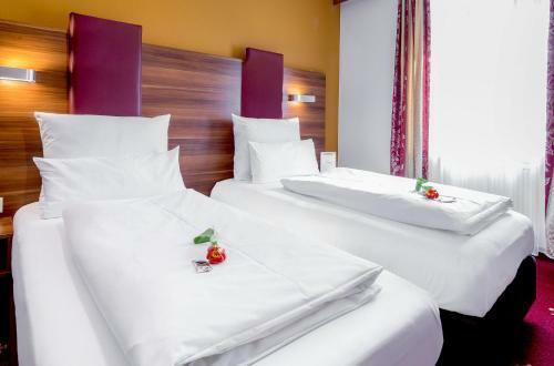 Tiptop Hotel Burgschmiet Garni